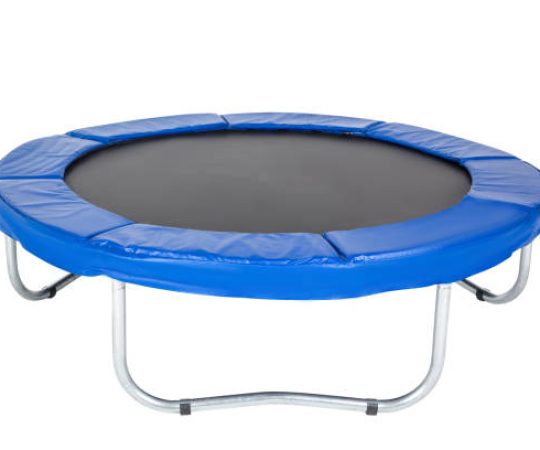 Trampoline for children and adults for fun indoor or outdoor fitness jumping on white background. Blue trampoline Isolated.